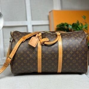 EXCELLENT CONDITION AUTHENTIC Keepall Bandoulière 50. Monogram canvas.